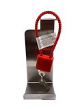 Wall-mount bracket holding a 1kg EcoZinc sunscreen pump